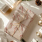 Geschenkpapier Zuckerstange | gefaltet